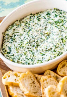 Easy hot, creamy spinach dip served with french bread.