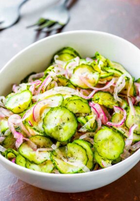 Cucumber salad in a serving bowl.