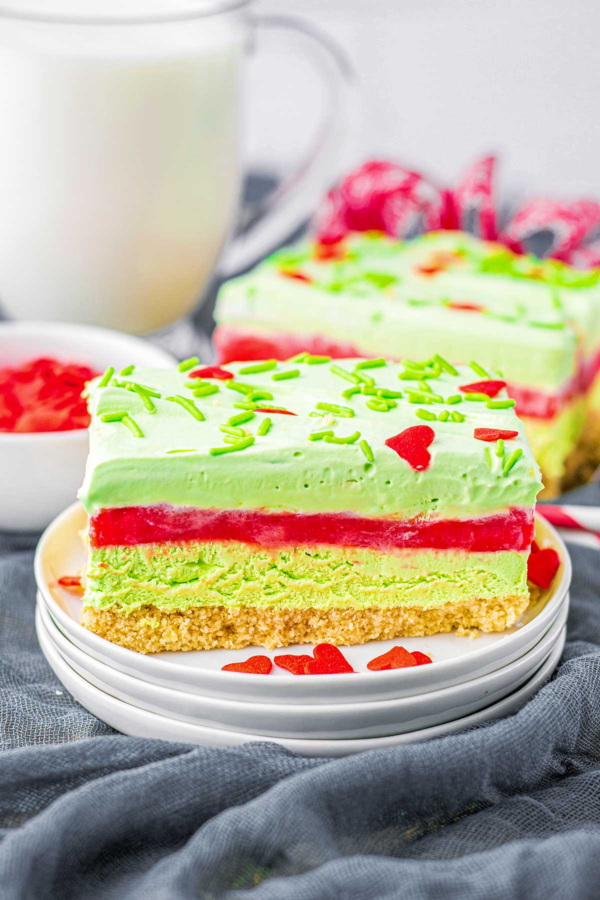 Side view of Grinch lush dessert, showing off the different colorful layers.